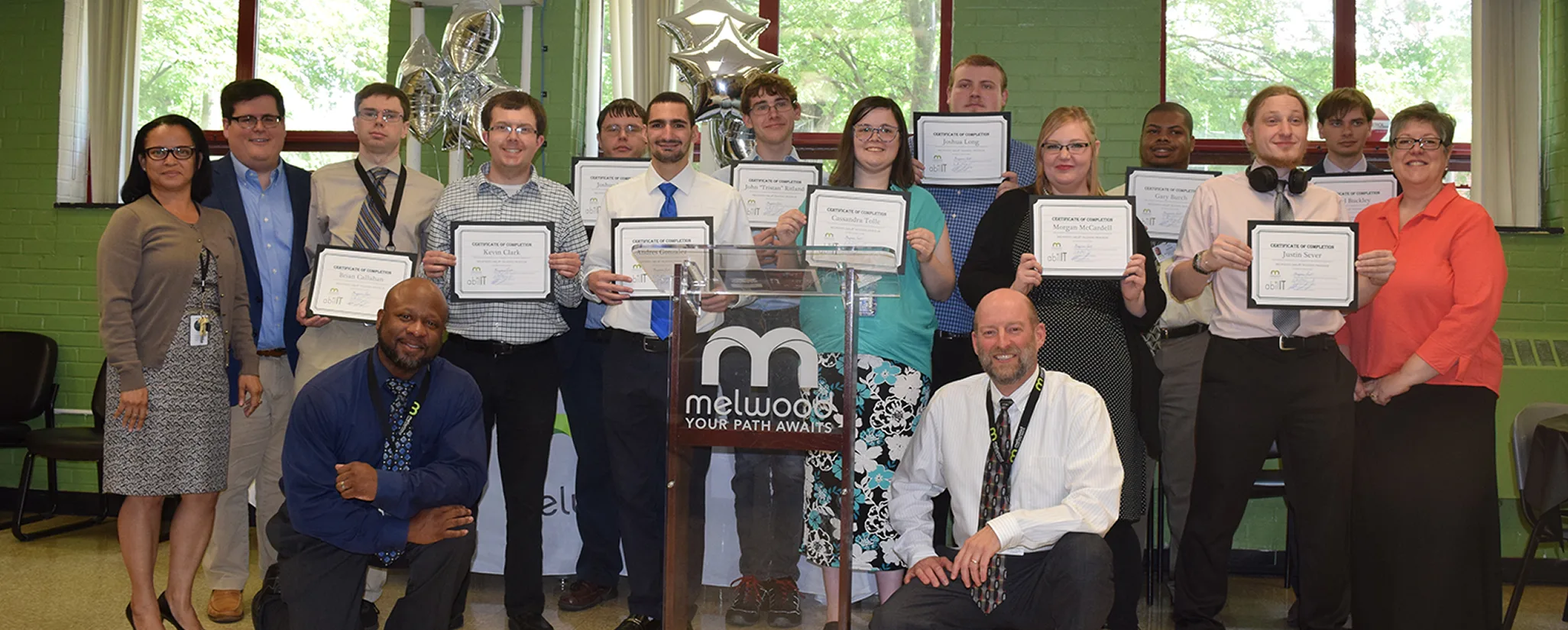 People participating in technology training and career development